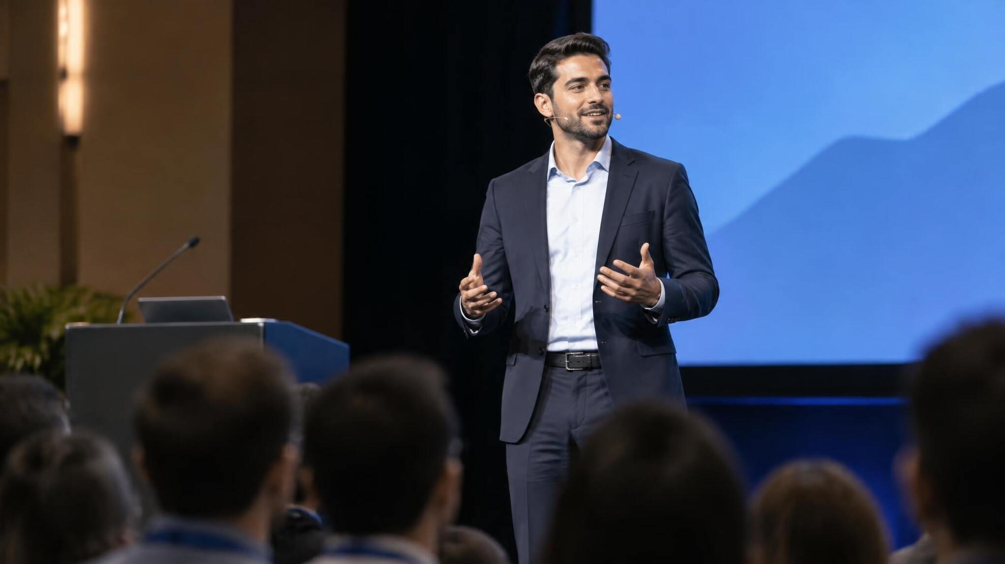 confident man speaking on stage